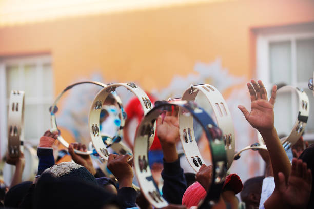 Tambourine Carnival Celebrations Tambourines held high during a street Carnival parade Kaapse Klopse Cape Malay Quarters Cape Town music culture stock pictures, royalty-free photos & images