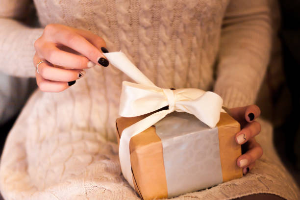 istock Caucasian woman open box with gift 1066860990