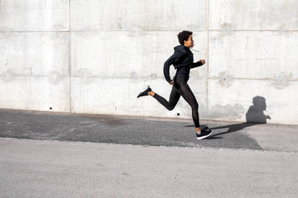 istock Young Woman Exercising in an Urban Environment 1066863318