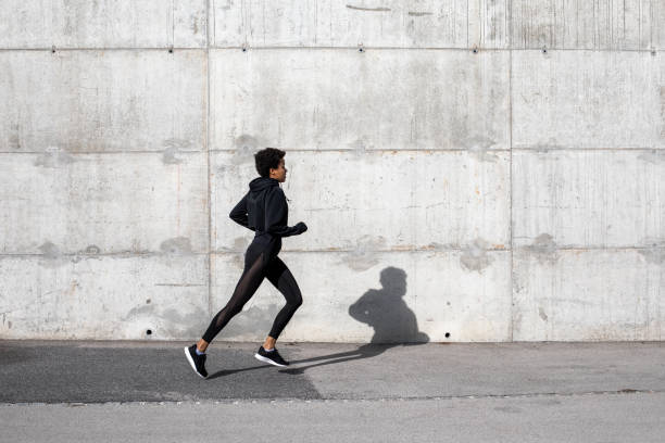 istock Young Woman Exercising in an Urban Environment 1066863440