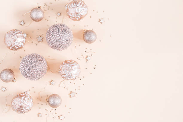 istock Christmas composition. Christmas decorations on pastel beige background. Flat lay, top view, copy space 1066865546