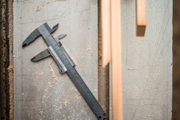 istock Working tools are on the table, top view. Caliper and wooden boards 1066865942