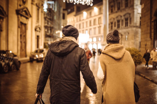istock friends walking on the city at night 1066867944