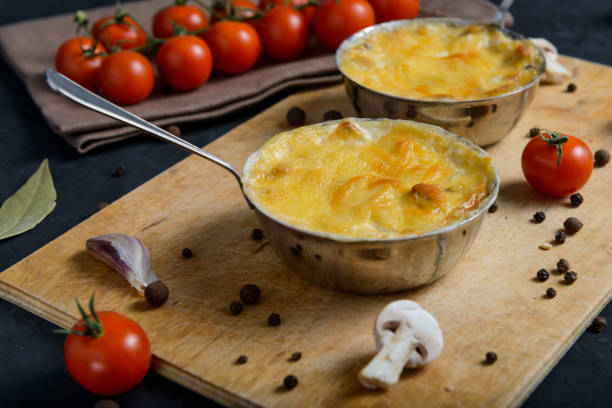 istock julienne with mushrooms on a wooden background 1066868336