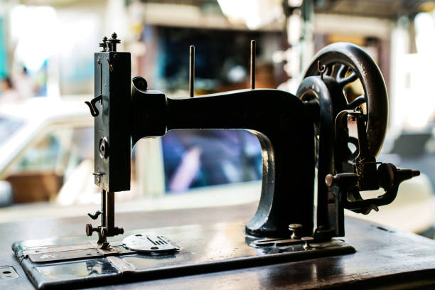 istock Ancient sewing machine Placed in an old-fashioned house in Thailand.soft focus. 1066868768