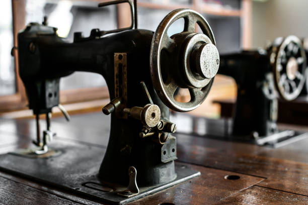 istock Ancient sewing machine Placed in an old-fashioned house in Thailand.soft focus. 1066868770