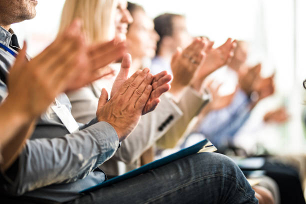 applauding on a business seminar! - people applauding congratulating business imagens e fotografias de stock