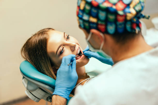 istock Dentist working with dental patient 1066872108