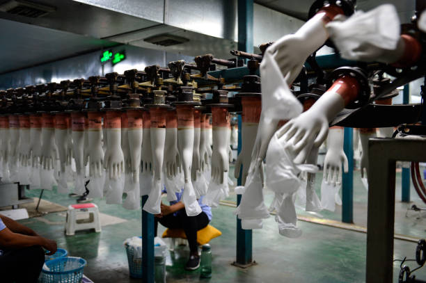 istock Rubber gloves production line 1066879654