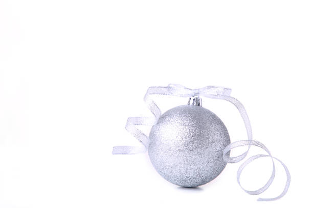 istock Silver Christmas ball with ribbon on white background 1066880554