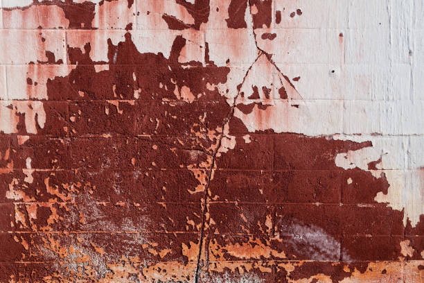 istock Old cement wall texture background in red tones 1066882292
