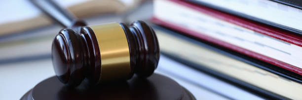 istock The judge hammer lies on table in 1066882552