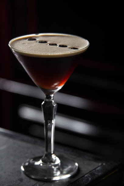 istock Espresso Martini cocktail on a bar desk. black background. 1066883474