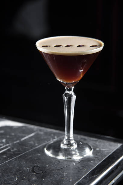 istock Espresso Martini cocktail on a bar desk. black background. 1066883792