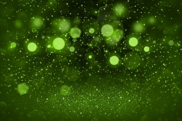 istock green fantastic bright glitter lights defocused bokeh abstract background with sparks fly, festive mockup texture with blank space for your content 1066892238