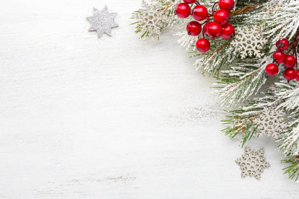 istock Fir branch with Christmas decorations on old wooden shabby background with empty space for text. Top view. 1066894490