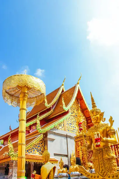 Photo of Golden building and umbrella in Wat Phra That Doi Suthep is the popular tourist destination of Chiang Mai, Thailand.