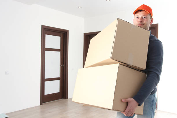 istock Courier holds boxes. Delivery services. Free shipping. 1066897364