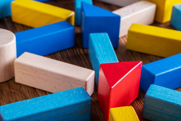 istock Abstract Background. Background with different colorful shapes wooden blocks. 1066906600
