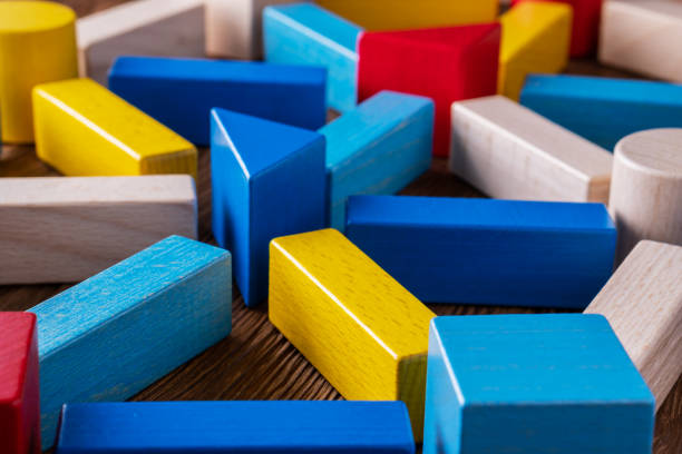 istock Abstract Background. Background with different colorful shapes wooden blocks. 1066906604