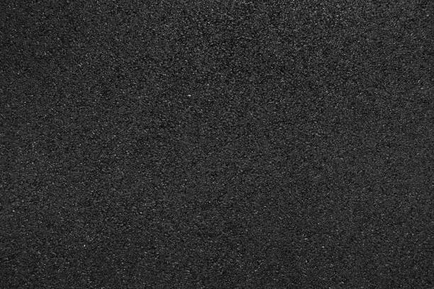 istock Black smooth asphalt road texture background top view 1066907874