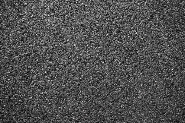istock Black smooth asphalt road texture background top view 1066907884