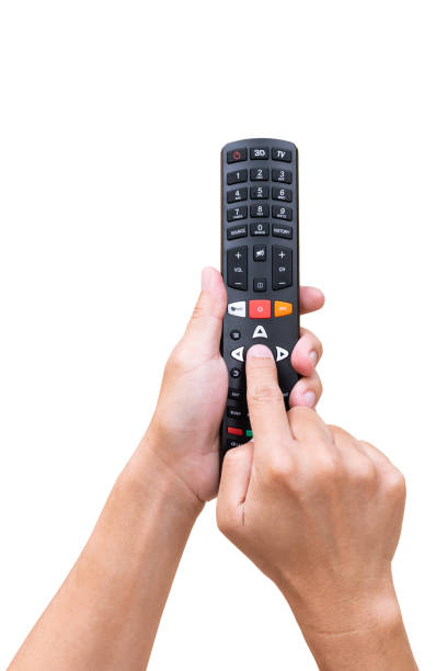 istock Television remote control in hand and press on white background 1066908124