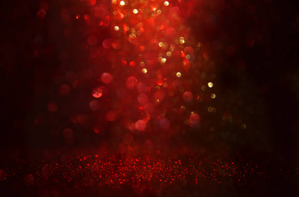 istock Red, black and gold glitter lights background. defocused. 1066909458