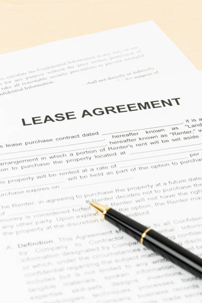 istock Lease agreement with pen; document is mock-up 1066911528