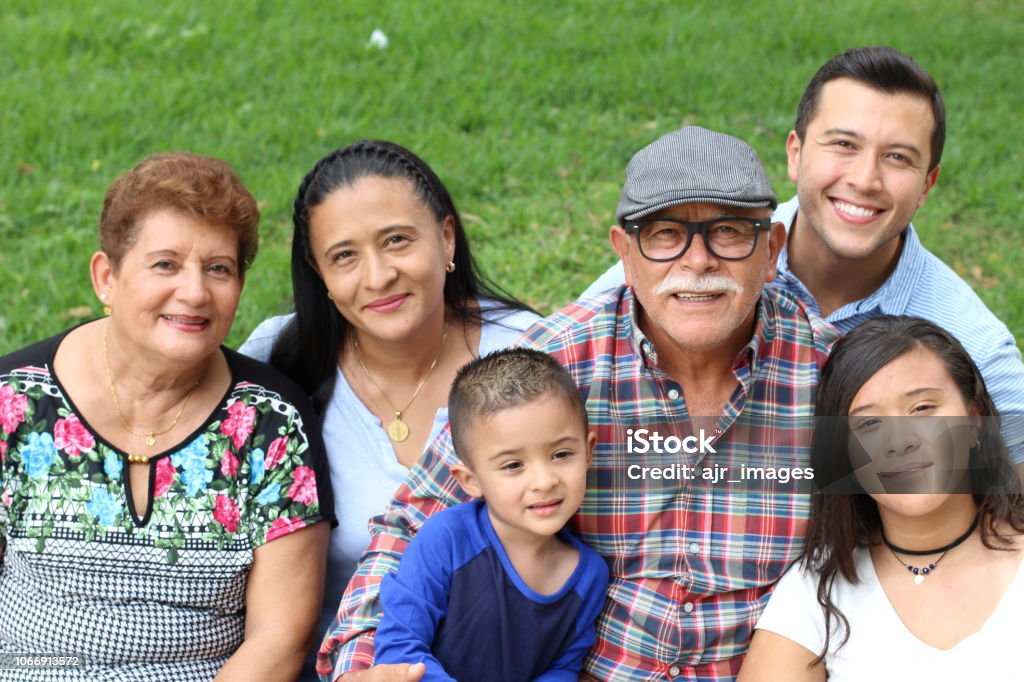 Hispanic family in the park Hispanic family in the park. Family Stock Photo