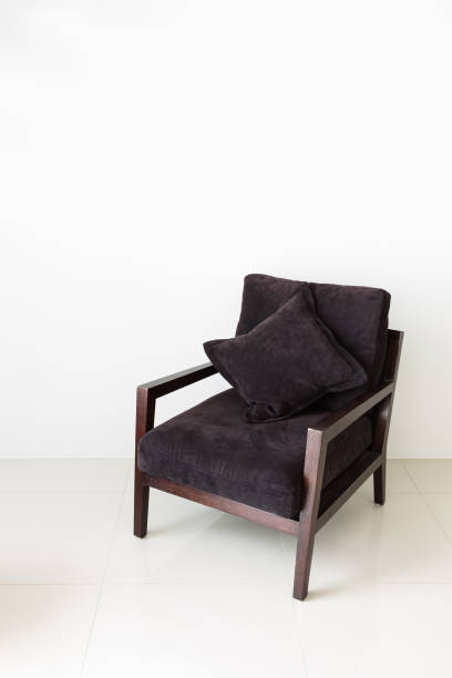 istock Brown chair with pillow 1066916684