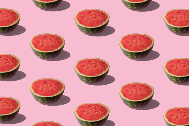istock Pattern of sliced watermelon on pastel pink background. Minimal 1066917176