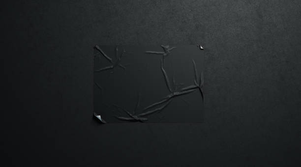 istock Blank black wheatpaste adhesive horizontal poster mockup dark textured wall 1066918332