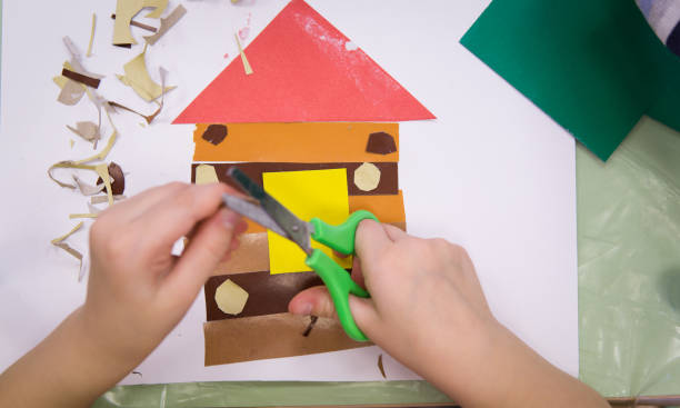 istock Cut out of paper to make an applique. 1066918334