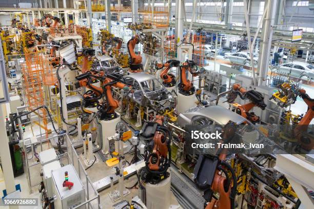 Body Of Car On Conveyor Top View Modern Assembly Of Cars At The Plant The Automated Build Process Of The Car Body Stock Photo - Download Image Now