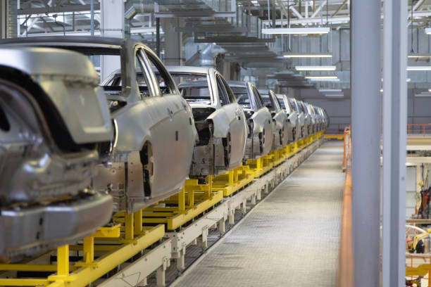 body of car on conveyor modern assembly of cars at plant. automated build process of car body - automobile industry metal industry in a row gear imagens e fotografias de stock