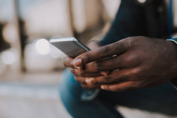 istock Selective focus of a smartphone in male hands 1066930118