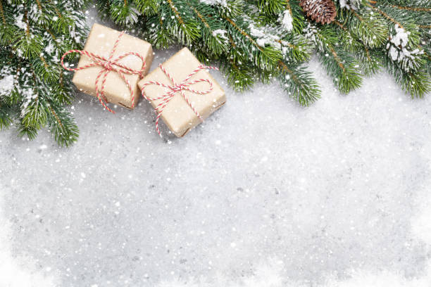 istock Christmas gift boxes and xmax fir tree 1066930918