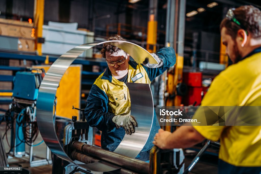 Teamwork Metal Teamwork And Cooperation In Heavy Industry Stock Photo - Download Image ...