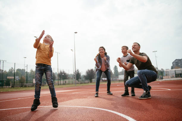 istock Family time on basketball field 1066931122