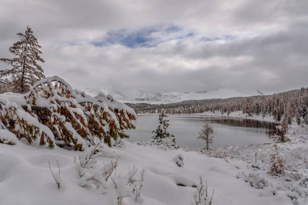 istock lake snow tree mountains autumn 1066932030
