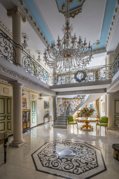 istock luxury lobby interior. Staircase with handmade wrought Iron Railing 1066933730