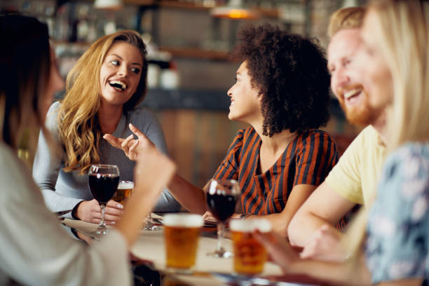 istock Friends chatting and drinking alcohol. 1066935092
