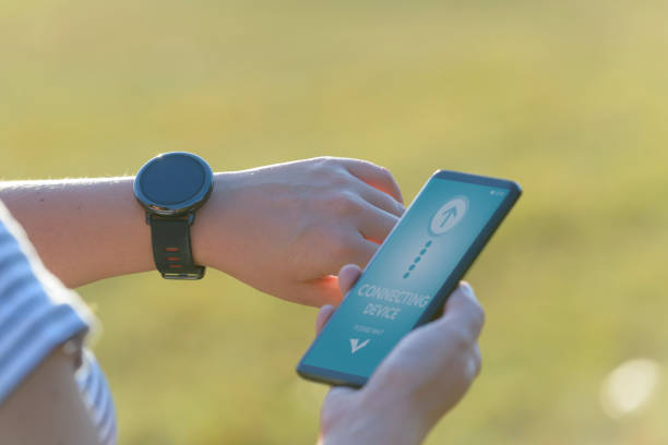 istock Woman is using the smartwatch and smart phone 1066935626