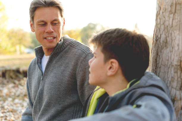 istock Father looking at his teenager son 1066935998