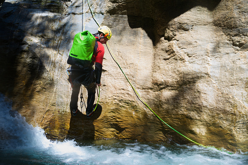 Canyoning in Gorgol Canyon in Pyrenees, Huesca Province, Aragon in Spain.