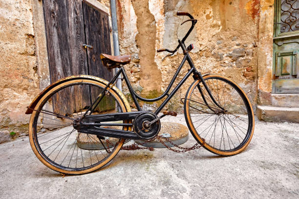 istock Old retro bicycle on vintage street 1066941302