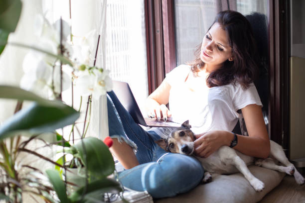 istock Young woman working on a laptop computer 1066943194