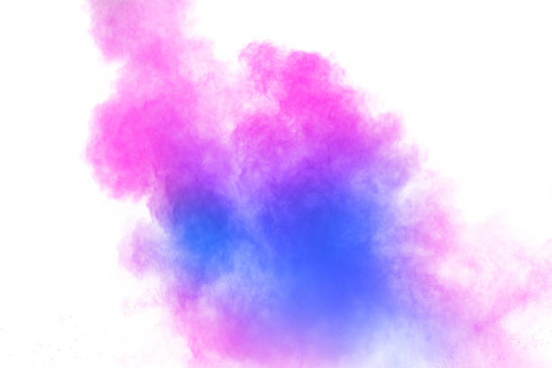 istock Bizarre forms of blue pink powder explosion on white background. 1066947016