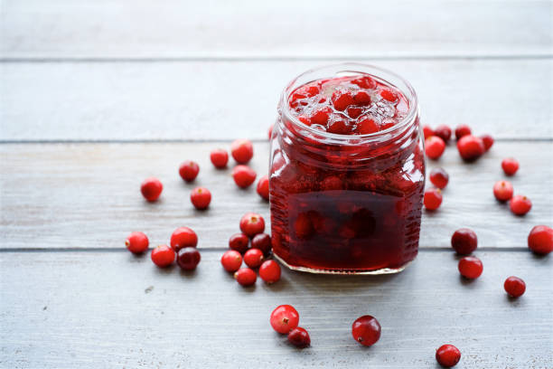 istock Cranberry sauce in glass jar 1066947470